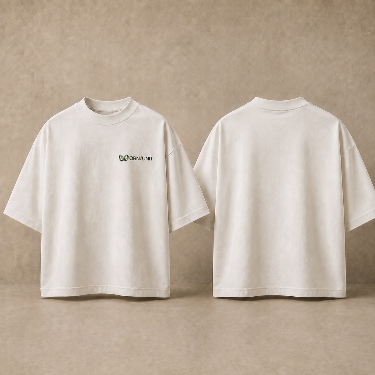 Front of the WORN UNIT Essential Tee 01 with a small left-chest logo beside its blank back